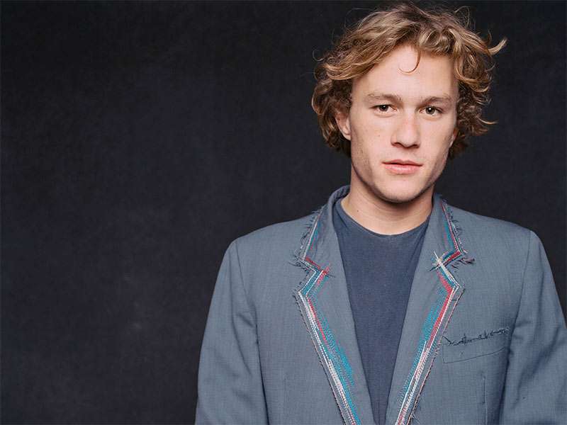 Heath Ledger with medium length dark blond hair